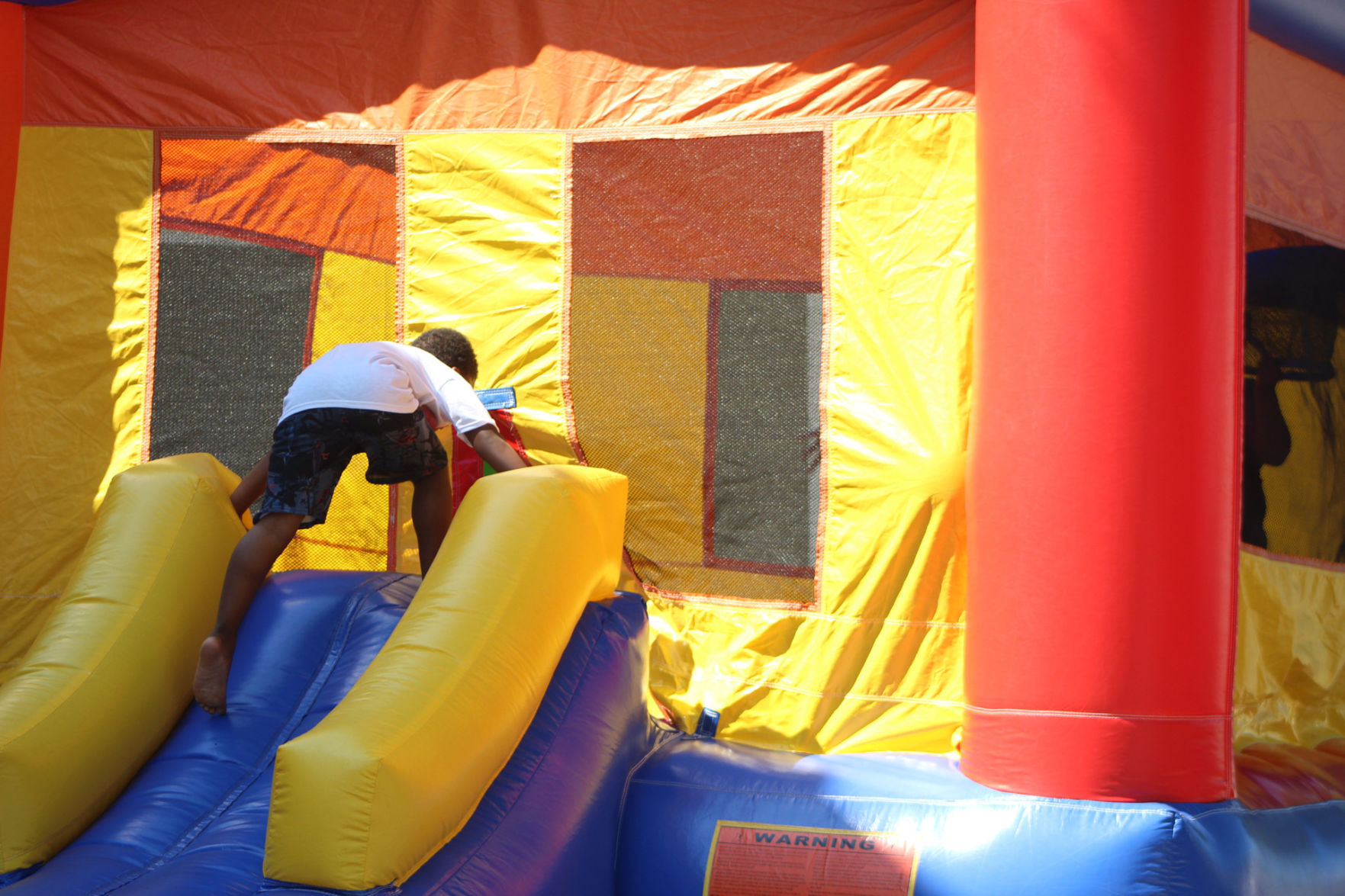 D-erick Seay and bounce house